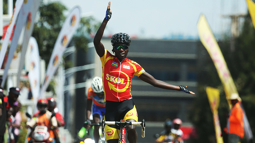 Club Benediction's youngster Didier Munyaneza celebrates his victory to win National Cycling Championship on Sunday. / Sam Ngendahimana