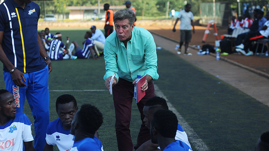 Newly appointed Rayon Sports head coach Roberto Oliveira Goncalves de Calmo gives instructions to his players during the match against Sunrise on Sunday (Sam Ngendahimana)