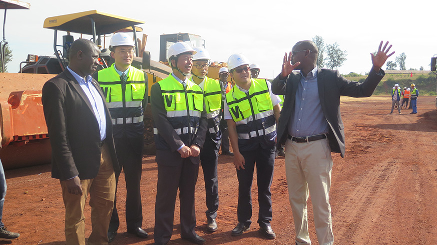 CRBC and Ngoma District officials touring the plot where the new stadium will be built. Eddie Nsabimana.
