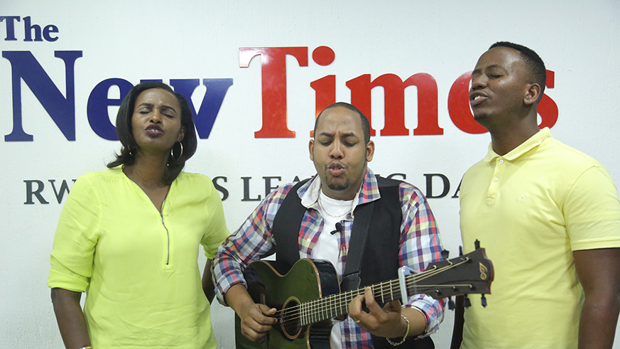 Fortran Bigirimana (centre) was accompanied by local artistes Gaby Kamanzi (left) and Jean Christian Irimbere to The New Times offices on Wednesday, to talk about his forthcoming concert. The singers sang an acapella shortly after the interview.