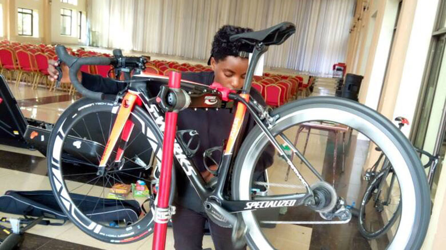 Uwayezu is the countryâ€™s first and only female mechanic in cycling. Courtsey.