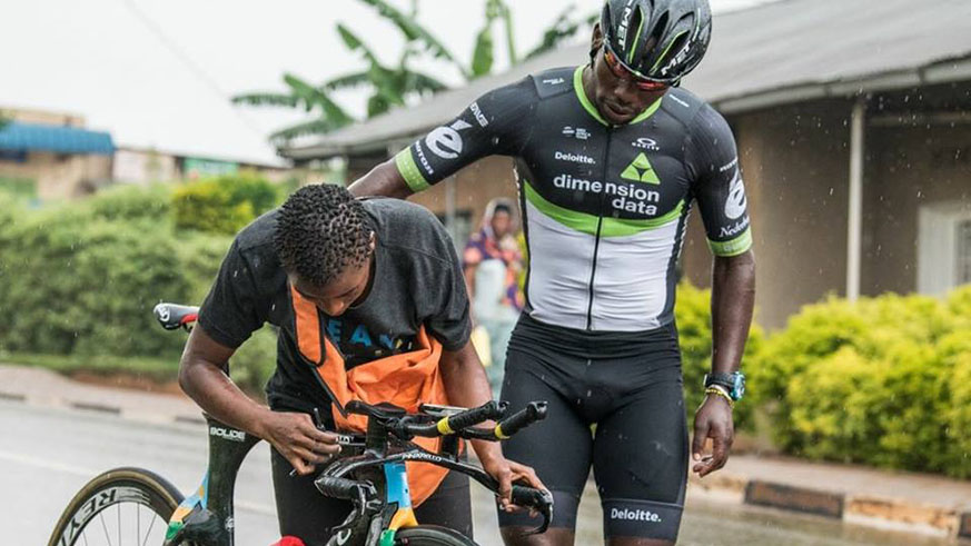 Sandrine Uwayezu is captured here fixing Joseph Areruya's bike in a past race. At the time Areruya raced for South African side - Dimension Data for Qhubeka. Courtsey