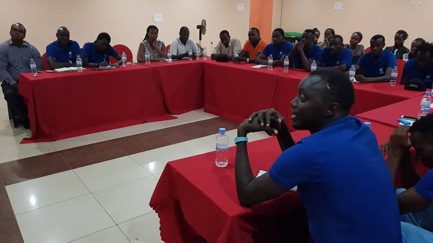 The national cricket team players listen attentively as  General Patrick Nyamvumba gave the motivational speech. Courtsey