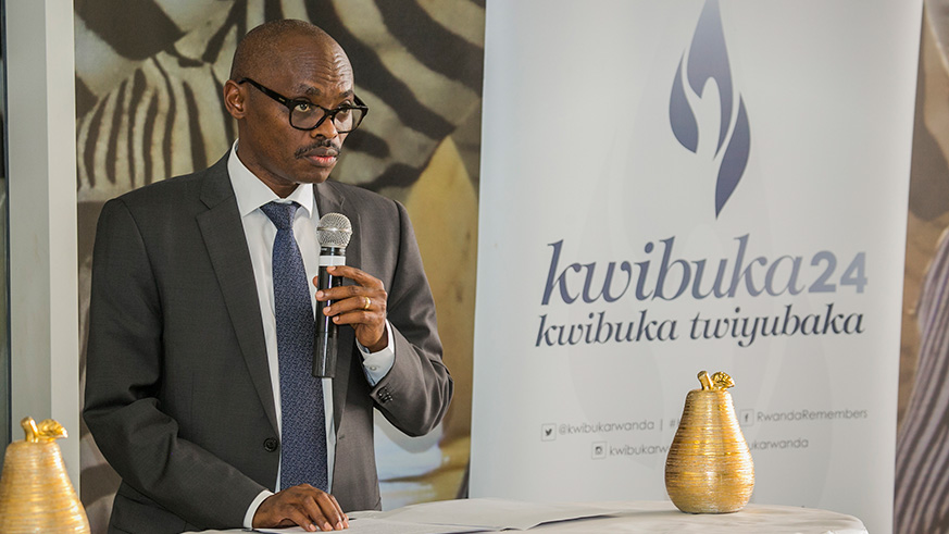 Rwandair deputy CEO Silver Munyaneza speaking after visiting a genocide memorial at Nyanza Kicukiro. Kelly Rwamapera