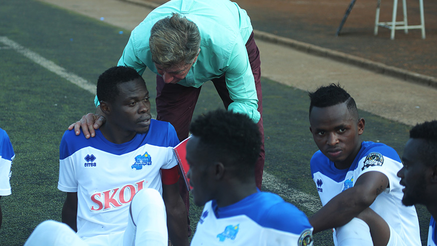 Rayon Sports head coach Roberto Oliveira Goncalves do Carmo speaks to the skipper Pierrot Kwizera during the half time, Kwizera scored one goal during a 2 all draw against Gor Mahia . Sam Ngendahimana