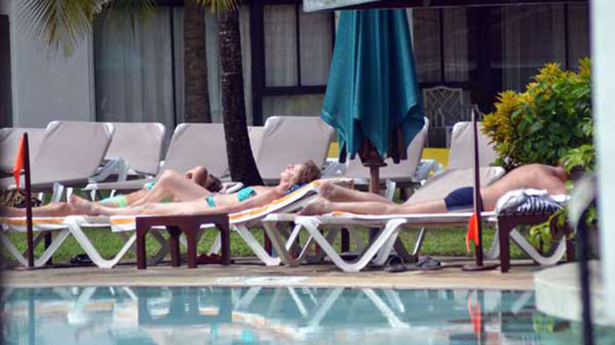 Tourists at Whitesands Beach Resort in Mombasa in a past picture. Coast residents are bracing themselves for colder-than-normal weather as temperatures in Mombasa County plunged to 19.8u00b0 C on July 12, 2016. Net.