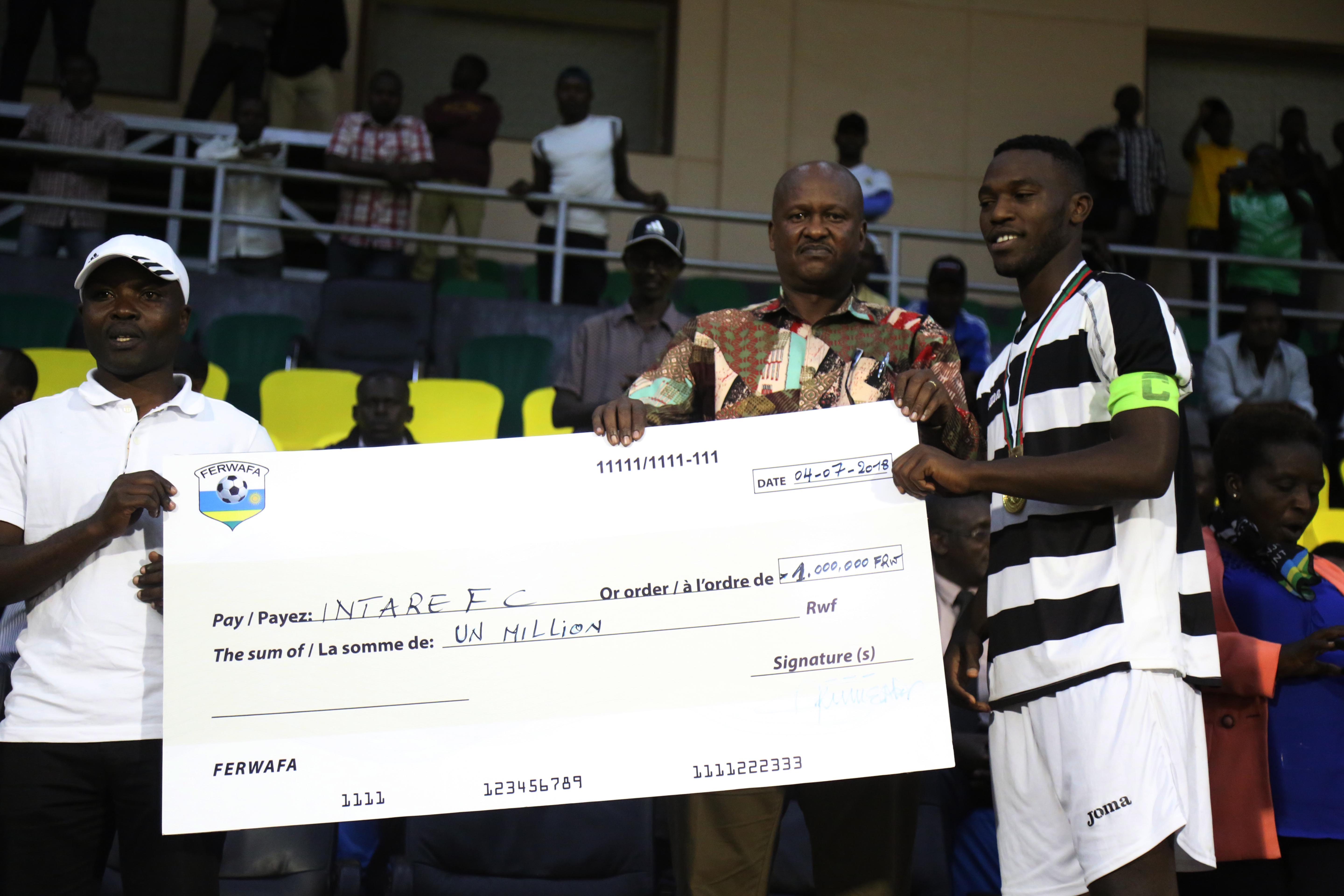 Second Division League Champion Intare FC get a cheque of one million Rwandan francs