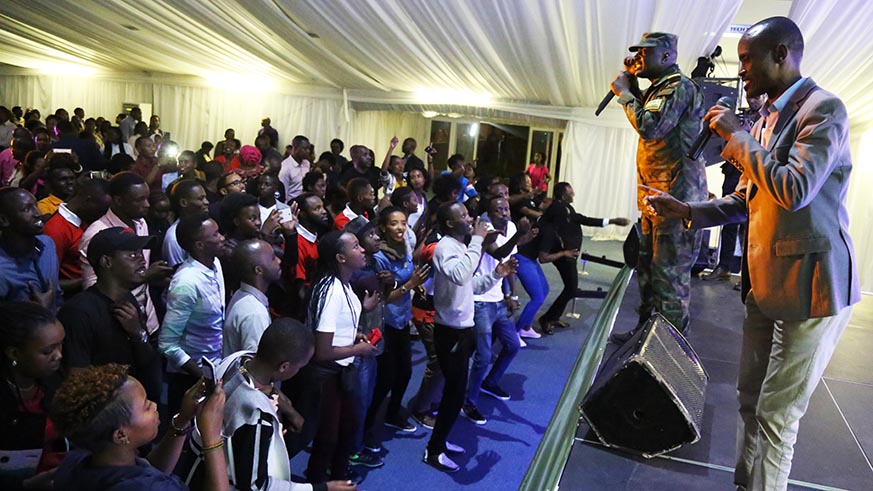 Singer Sgt Robert is applauded by the audience during Bonhommeâ€™s album launch at Kigali Conference and Exhibition Village on Tuesday night.