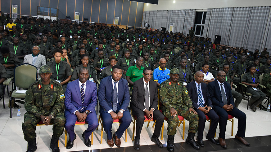 Defence Minister James Kabarebe (C) with other senior officials including provincial Governor Fred Mufulukye (2nd left) and the chairman National Itorero Commision Edourd Bamporiki.