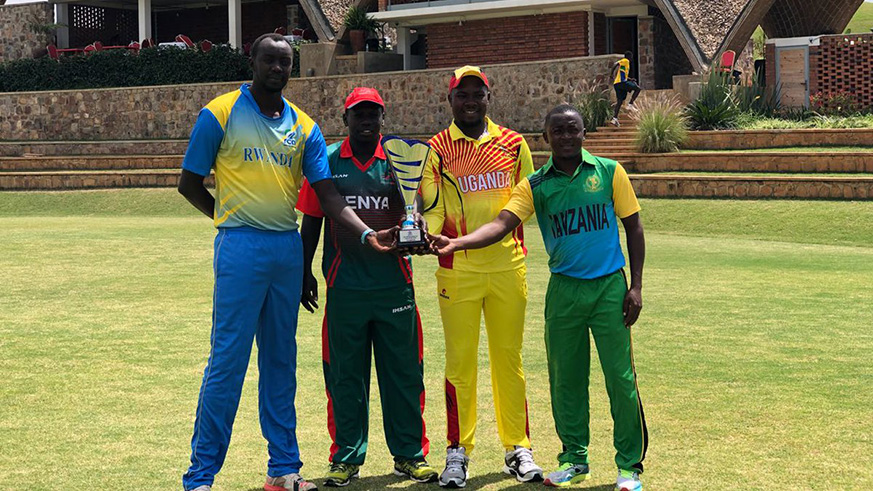Team Rwanda captain Eric Hirwa Dusabemungu (left) poses for a group photo with his counterparts from Kenya, Uganda and Tanzania yesterday at Gahanga Cricket Stadium. Courtesy.