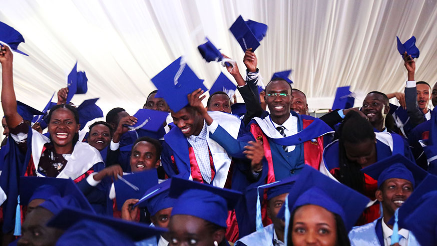 University of Kigali graduands celebrate during the graduation ceremony at Kigali Cultural Village yesterday. Sam Ngendahimana.  
