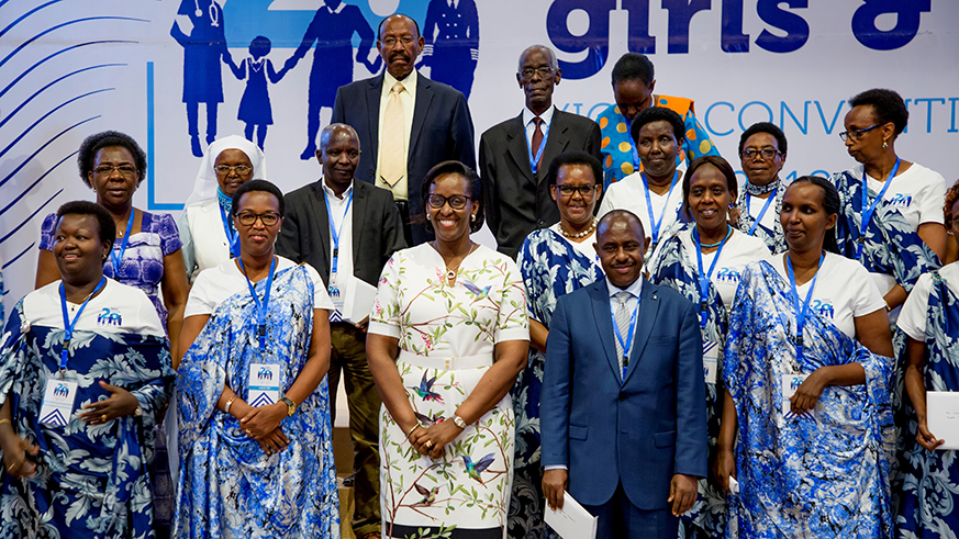  First Lady Mrs Jeannette Kagame, Minister Dr Eugene Mutimura of the Ministry of Education (right) with FAWE staff, founder members and teachers during the National Conference on Investing in Education held in Kigali. The meeting coincided with the 20th Anniversary of FAWE-Rwanda. Courtesy.