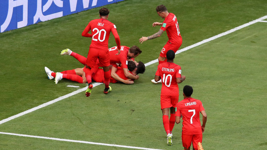 England players celebrate after Harry Maguireu2019s goal in the first half. Net photo.