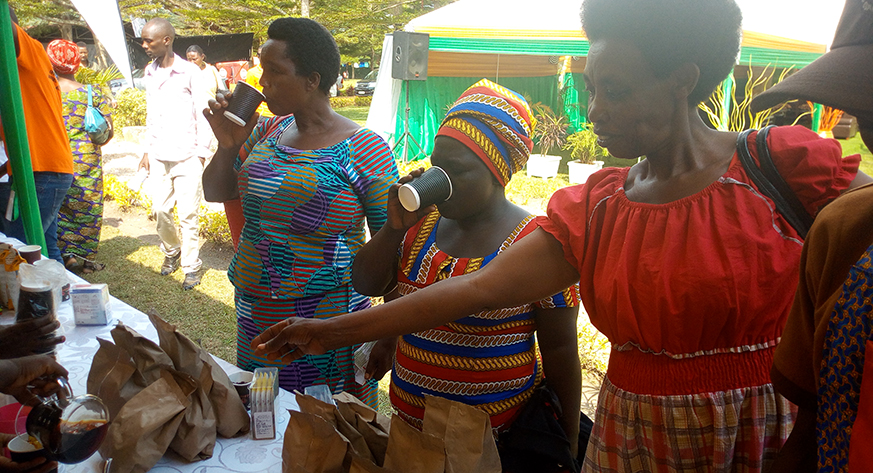 People taste coffee during the agricultural expo last week. Michel Nkurunziza. 