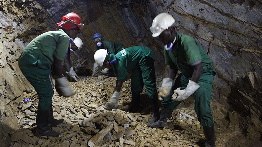 Miners at work inside Mageragere mining site in Nyarugenge District. File.