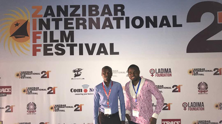 (L-R): John Kweli, president of Rwanda Film Federation and Wilson Misago of Seburikoko, at the ZIFF 2018 awards in Zanzibar, Tanzania.  Courtesy.