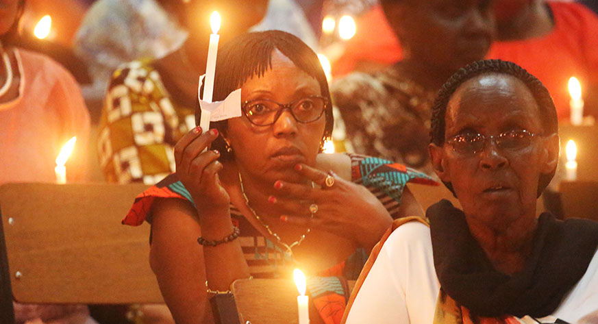 Mourners during a night vigil at St Paul last month. Over 2000 survived from St. Paul Pastoral Centre. Sam Ngendahimana.