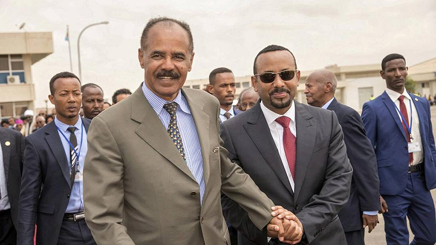 Eritrean President Isaias Afwerki (left) receives Ethiopian Prime Minister Abiy Ahmed in Asmara on Sunday. Net photo.