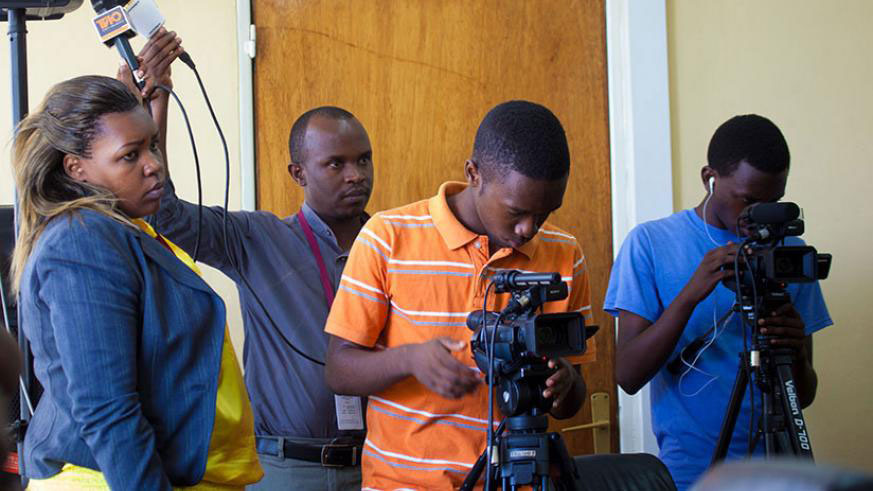 Journalists cover an event in Kigali. / File