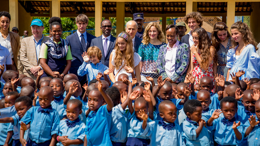 Officials from Imbuto Foundation, Western Province and development partners in a group photo with children from Karambi ECD. Courtesy.