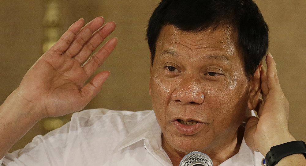Philippine President Rodrigo Duterte gestures as he answers questions from reporters during a press conference. / Sputnik