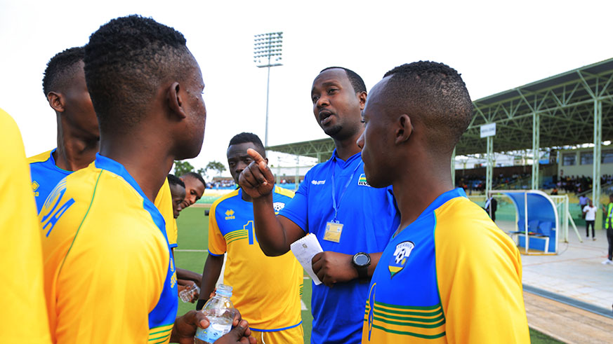 Junior Amavubi players listen to the coach Vincent Mashami before facing Kenya in AfCON qualifiers earlier this year at Kigali Stadium. Sam Ngendahimana.