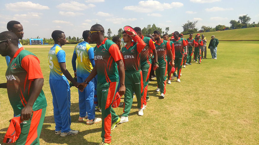 Kenya Sambas shake hands with their Rwandan counterparts before the game kick-off on Wednesday at Gahanda Cricket Oval in Kigali. Courtesy.