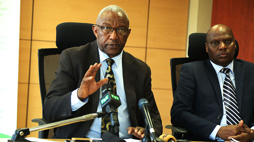 The National Electoral Commissionu2019s chairperson Prof. Kalisa Mbanda (left), and Charles Munyaneza, the Commissionu2019s Executive Secretary during a news briefing yesterday. Sam Ngendahimana.
