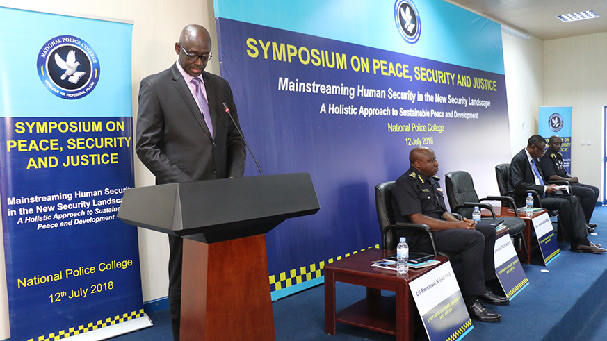 Minister Busingye gives his key note address at the opening of the symposium in Kigali at the Rwanda National Police General Headquarters in Kacyiru.  Courtesy.
