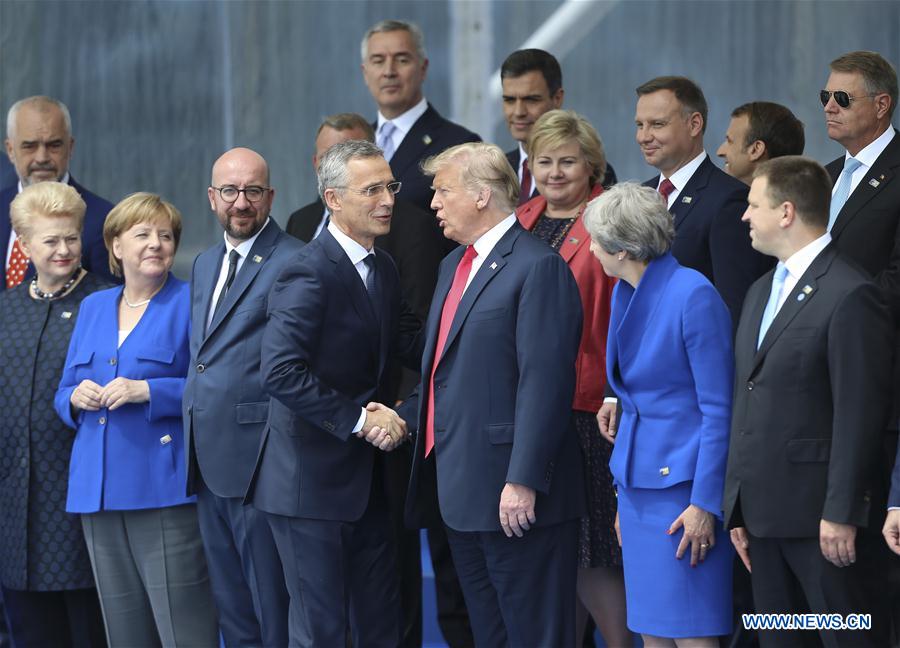 NATO Secretary General Jens Stoltenberg (center L) shakes hands with U.S. President Donald Trump during a NATO summit in Brussels, Belgium, July 11, 2018. NATO leaders gather in Brussels for a two-day meeting. (Xinhua/Ye Pingfan)