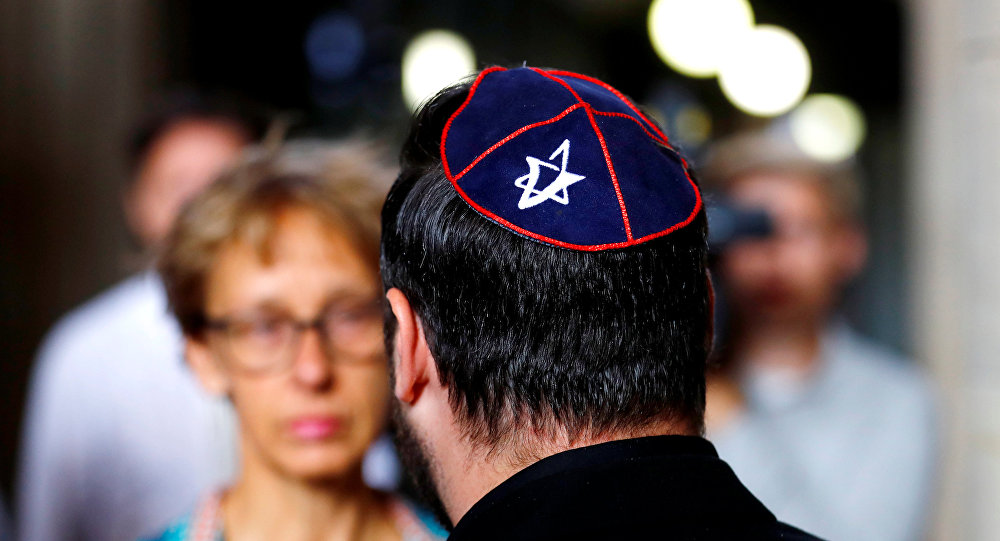 A member of Jewish community wearing a kippah talks to the media, before the start of the trail of a Syrian charged with assault after attacking an Arab-Israeli man wearing a kippah, at the Moabit court in Berlin, Germany. / Sputnik