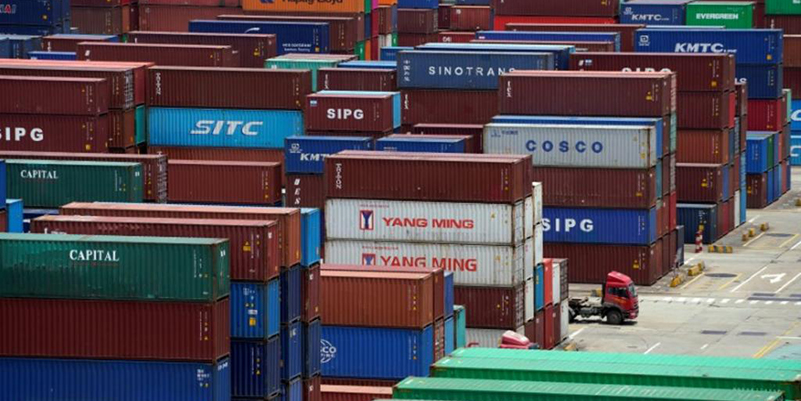 Shipping containers are seen at a port in Shanghai. Reuters.