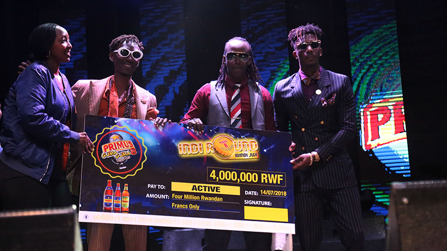 Boy group Active receive  their cheque.