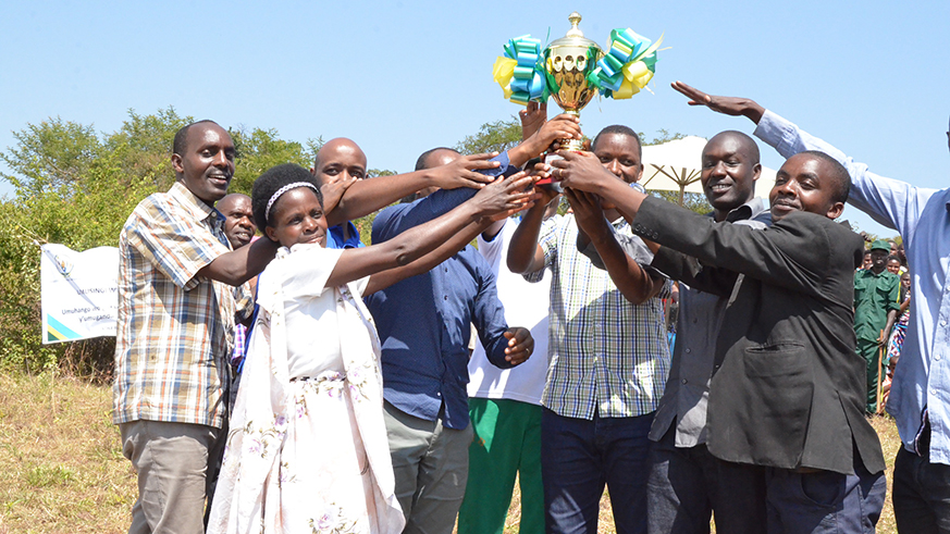 Kirehe residents carry their trophy aloft on Saturday. Jean de Dieu Nsabimana. 