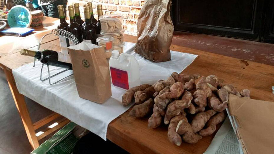Wine and bicuits that are produced from potatoes by Jean Paul Ntezimana. Regis Umurengezi