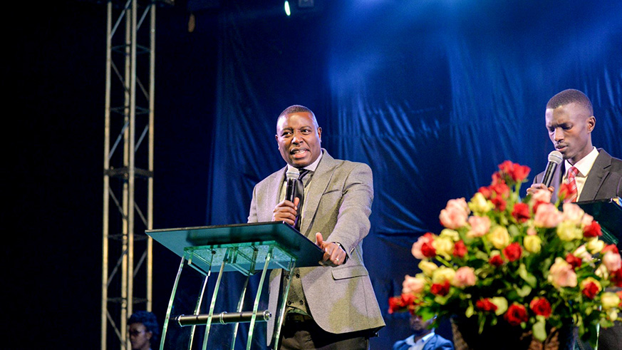 Apostle Dr Paul Gitwaza addressing the congregation.