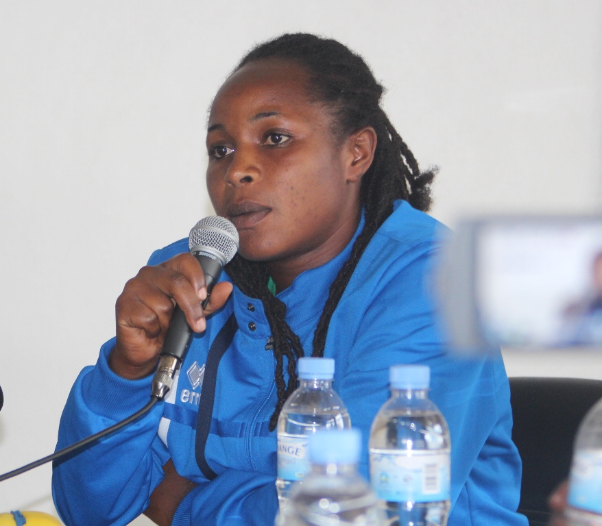 She-Amavubi skipper Sifa Nibagwire speaks to members of the media during a press conference held yesterday at Ferwafa Head Offices in Remera. Courtesy