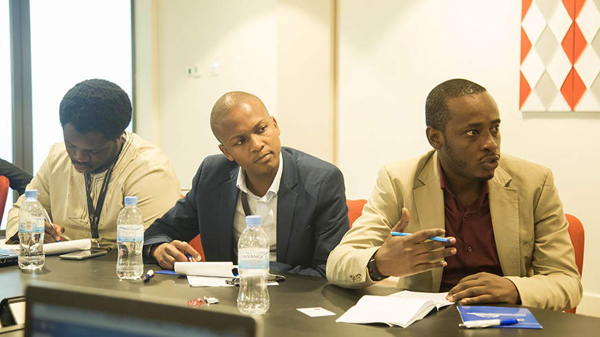 A journalist poses a question during the GSMA news conference yesterday. Nadege Imbabazi. 