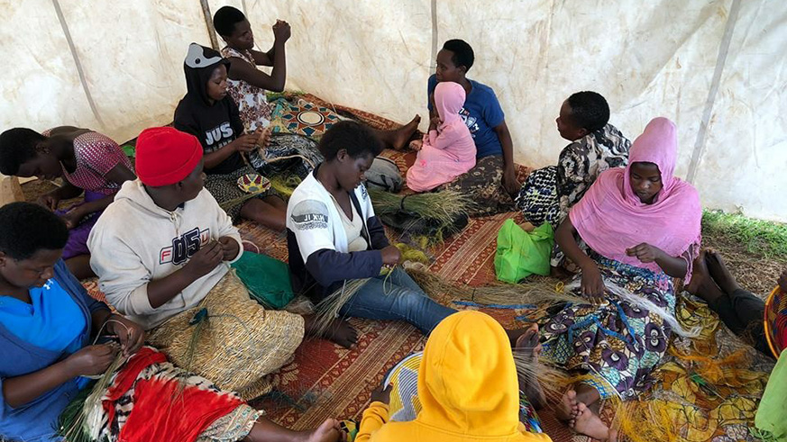 Former sex workers weaving baskets to boost their livelihood. 