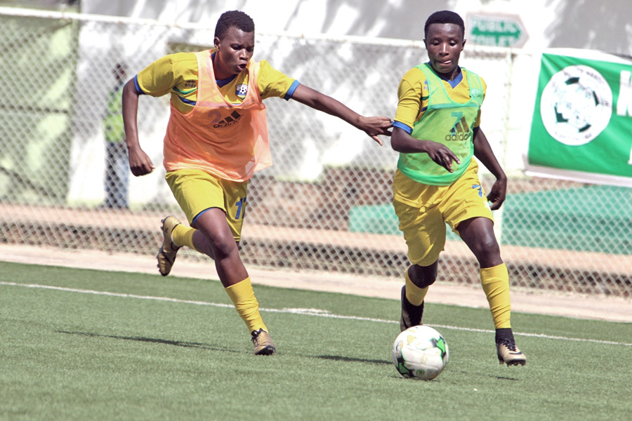 She-Amavubiu2019s Joselyne Mukantaganira (left) and Miliam Nyiransanzabera(right) are likely to start against Tanzania today. They are seen here vying for the ball during a training session last week at Kigali Stadium. Courtesy.