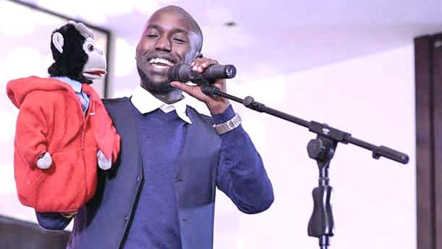 Uwiringiyimana on stage with his puppet during the Seka live show on July 1.