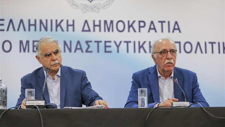 Greek Migration Minister Dimitris Vitsas (R) attends a press conference in Athens, Greece, on July 18, 2018. Greek Migration Minister Dimitris Vitsas urged on Wednesday all EU member states to follow a European path on handling the migrant and refugee crisis instead of unilateral acts. (Xinhua/Lefteris Partsalis)