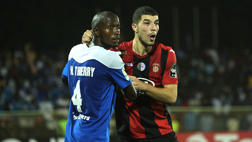Thierry Manzi in action against Mohammed as they wait for a corner kick