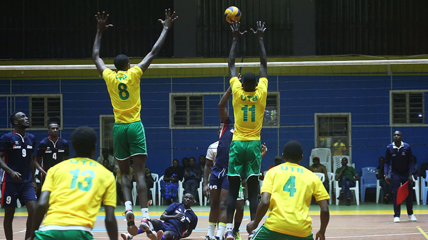 UTB players try a block during a league match against REG. Both teams will participate in KAVC tourney in Kampala. Sam Ngendahimana.