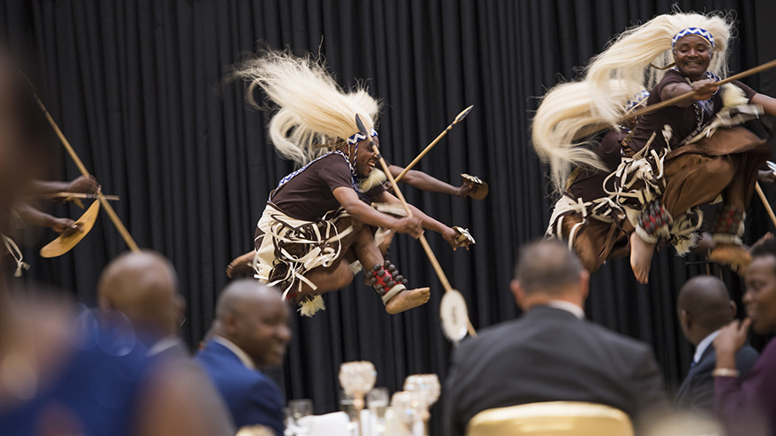 Intore dancers entertain guests at the state banquette organised in honour of the Mozambican leader at Kigali Convention Centre on Thursday. Village Urugwiro.