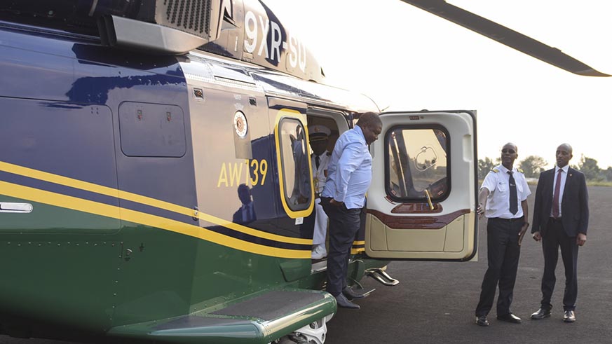 President Nyusi disembarks from a helicopter in Rubavu District, where he toured La Corniche one-stop border post between Rwanda and DR Congo, on Friday. Courtesy.