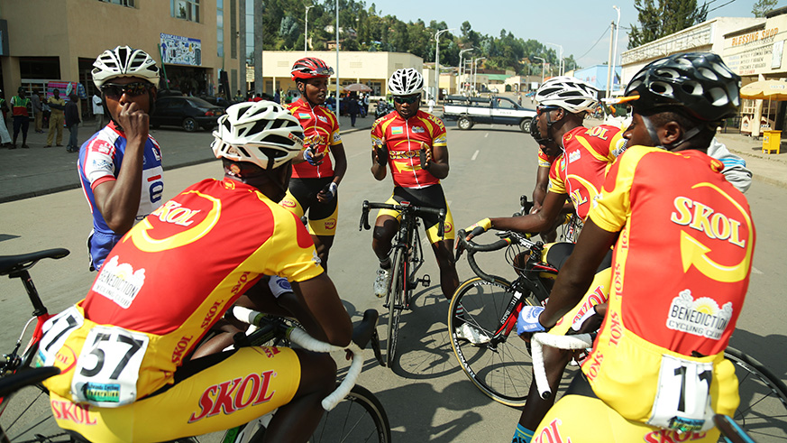 Benediction club riders share ideas before the race in Musaze