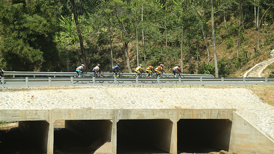 Riders cross one bridge in Rutsiro District