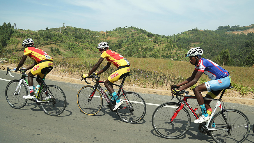 Riders in a break away while climbing some hills in Rutsiro