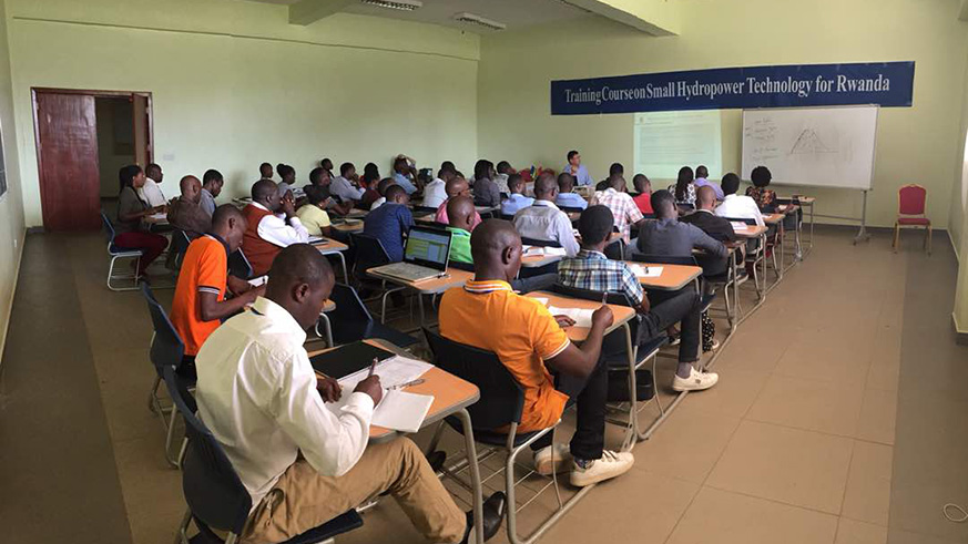 An instructor explains a procedure  during a training session.